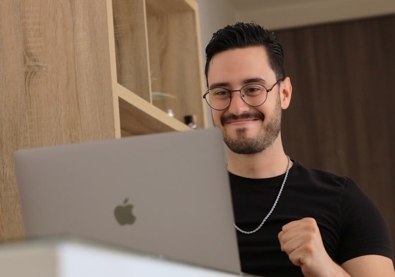 A founder working at a laptop